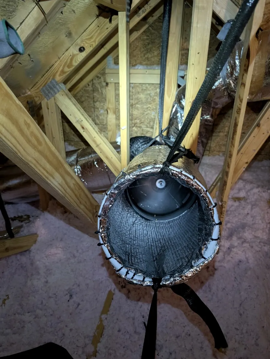 Attic Torpedo hanging between rafters, aimed into the attic