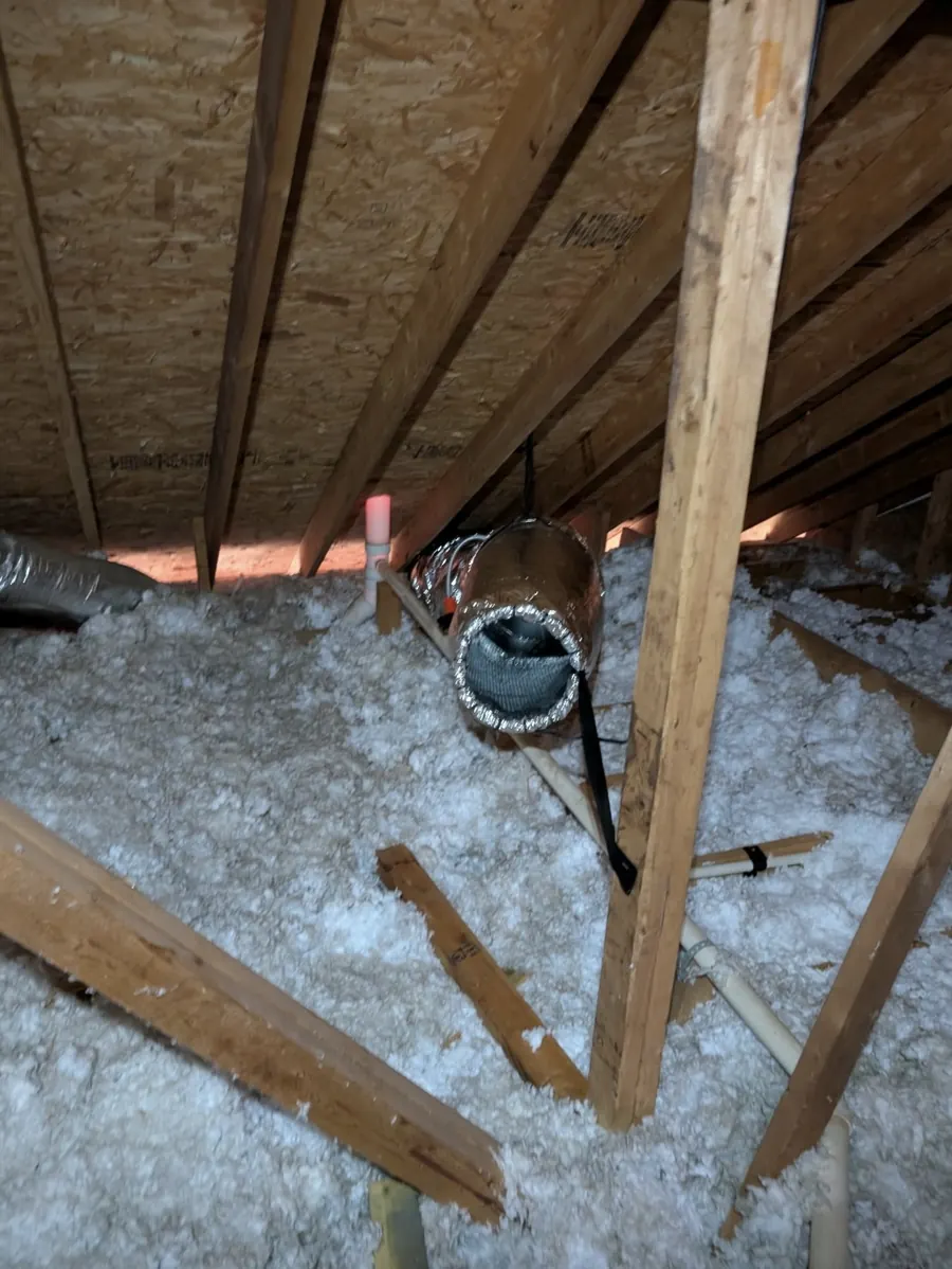 Wide view of an attic with an Attic Torpedo installed